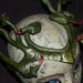 Medusa headpiece, in dark and light greens like the green mamba