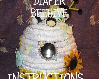 INSTRUCTIONS How To Make a BEEHIVE from diapers. Great Gender Reveal idea; "What's it gonna BEE?"
