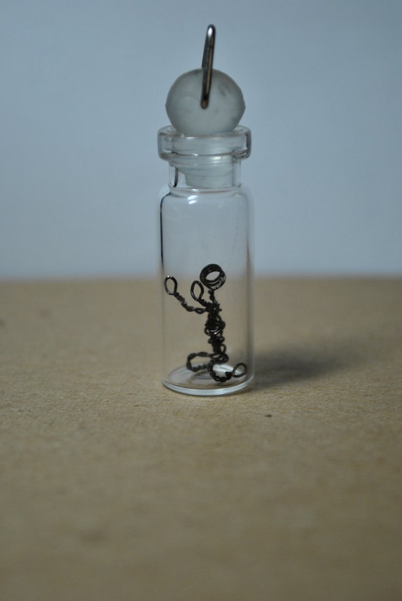 Wire Man/Stick Figure in a Bottle: On your Knees by Thumbelyna