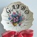 Gaybo plate with bow