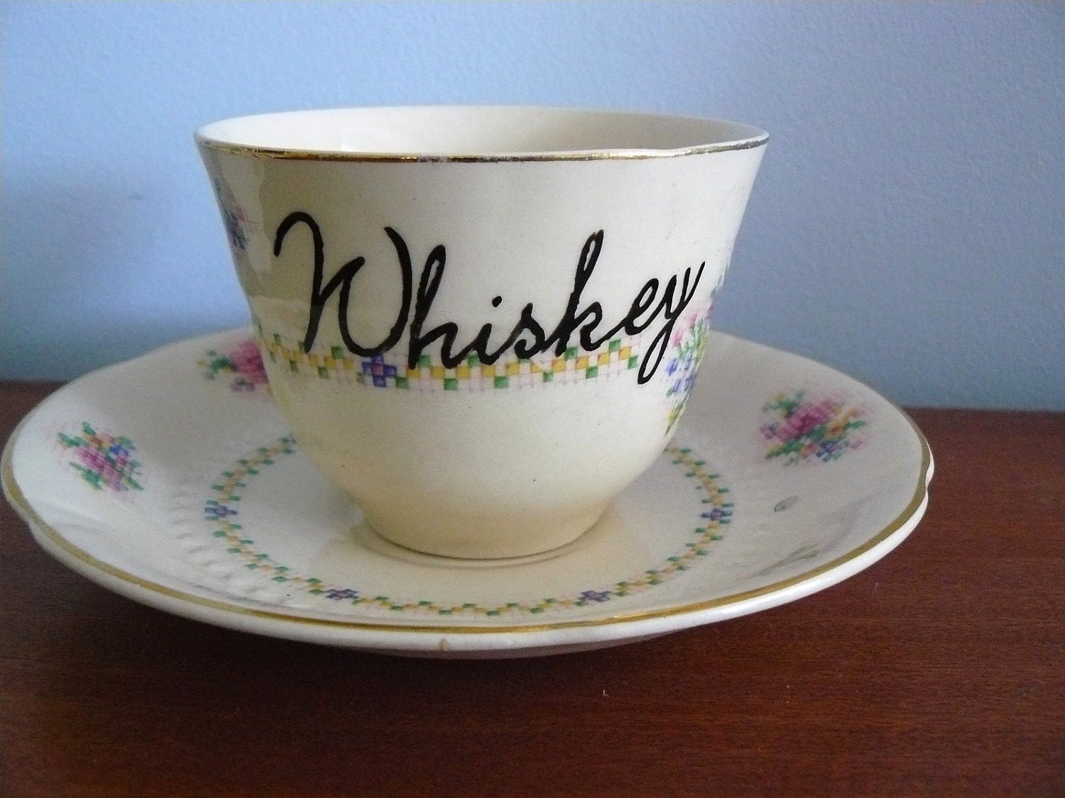 a whiskey in a teacup