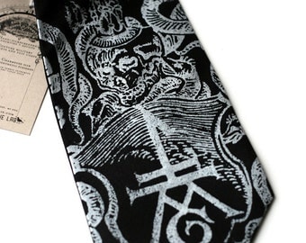Ex Libris black silk tie, book imprint, antique skull print. Silkscreened necktie, silver screen print.