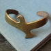 bird bracelet cuff in a tribal design for bird fashion in vintage brass