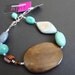 CLEARANCE - AFTER the STORM beaded bracelet made with semi-precious stones, mother of pearl shells and all sterling silver parts. Funky.