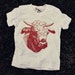Organic natural t-shirt with burnt orange cow 12-18 Months