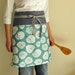 Reversible half apron - flowers on seafoam gray band