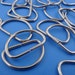 40 pieces . d rings in silver / 1.25" size . 1 inch interior . dee rings . LAST in stock