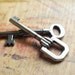 Bright Eyes Antique Key Duo