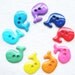 Whale 2-hole button - 24 pcs
