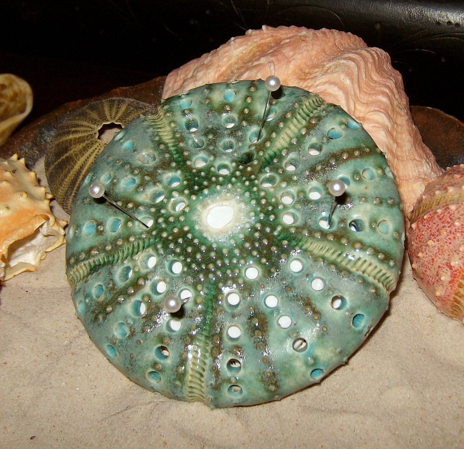 ceramic sea urchin pin cushion in turquoise blue by EarthElements