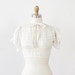 White 1930s Cropped Top with Ruched Sleeves and Bow