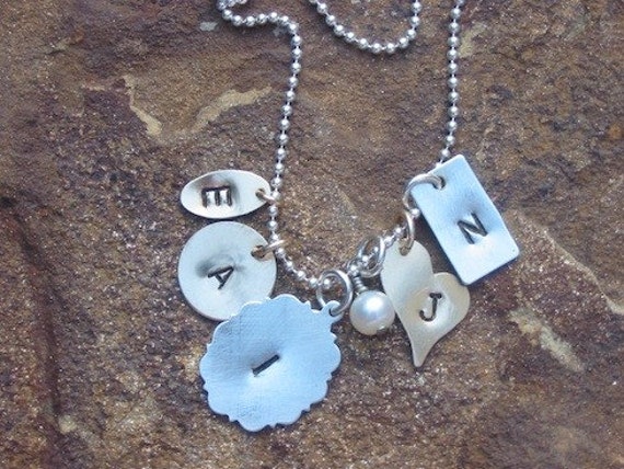 Items similar to Mi Familia Hand stamped initial necklace on Etsy