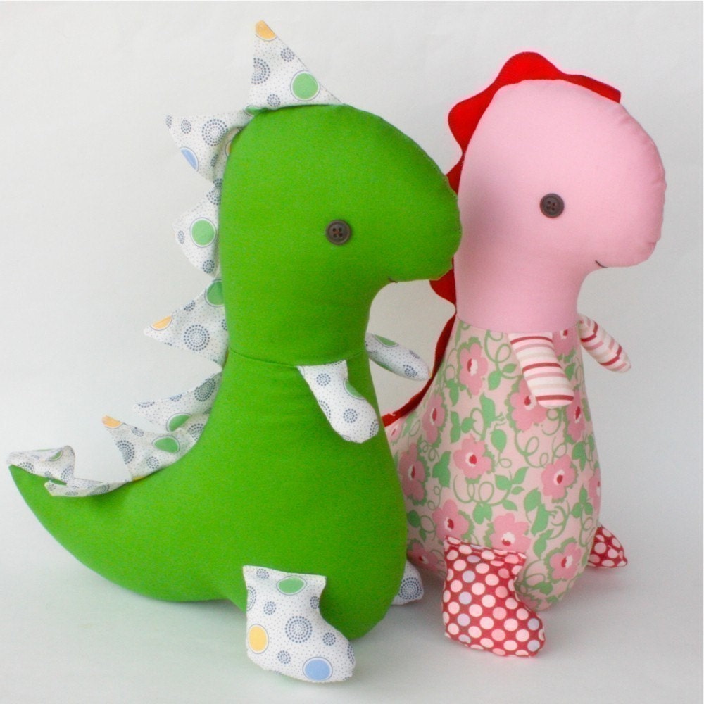 dinosaur and doll