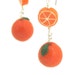 Orange earrings : whole and sliced oranges
