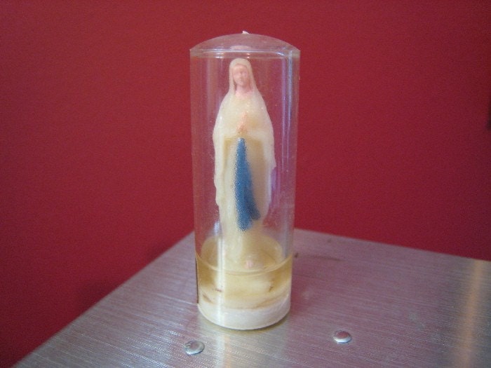 miniature virgin mary statue