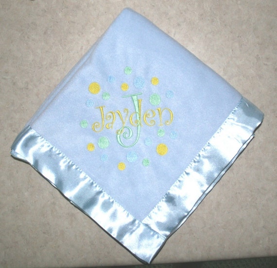 Personalized embroidered baby blanket with satin trim