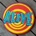 ALIVE Sideshow banner bullet painting