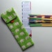 Stripey Pick Up Sticks in a Lime Green Elephant Print Pouch
