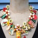PRICE REDUCTION Toy Story - A Vintage Toy and Flower Necklace