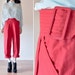 red high waist trousers / cummerbund waist / s
