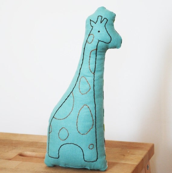Items similar to embroidered giraffe pillow in light teal on Etsy
