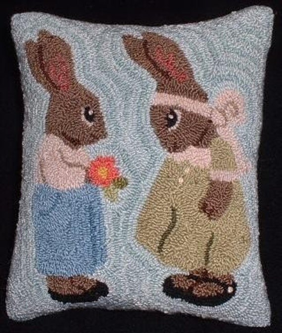 Items similar to Primitive Needle Punch Pillow Spring Bunnies on Etsy