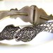 Reserved for Alina -- SJK VINTAGE -- Antique Silver Repousse Double Headed Snake Clamper Bracelet -- Egypt Revival (1960's-70's)