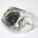 Clear resin ring with bornite