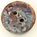 Round Raku Button