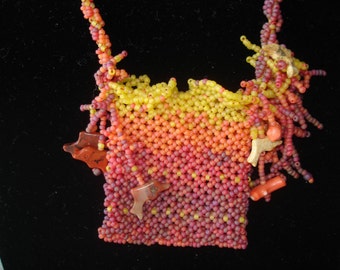Caught in the Coral Netted Amulet Bag