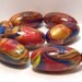 12x24mm. handmade golden swirl oval beads
