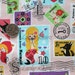 Fairytale Stamps on Pink Japanese Fabric - Half Yard