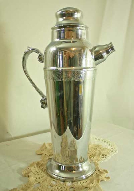 Items similar to Vintage chrome cocktail shaker with spout and handle