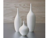 Trio of pure white ceramic bottle vases in modern matte white vessel bud vase by Sara  Paloma Pottery.  white vases mid century modern decor