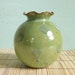 small green ceramic vase for flowers green vase