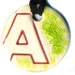 Stylized A Ceramic Necklace in Green Red and White