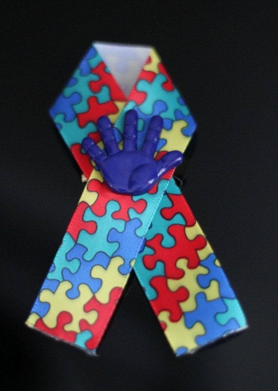 Autism Awareness Ribbons With Blue Hand