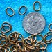 100 Oval Gold-Toned Jump Rings. 18 gauge - 6.8 x4.7 mm diameter. Vintage. Last Order.