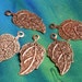 Antique copper leaf charm 21x12mm, pk 12 (item ID ACLC21x12)
