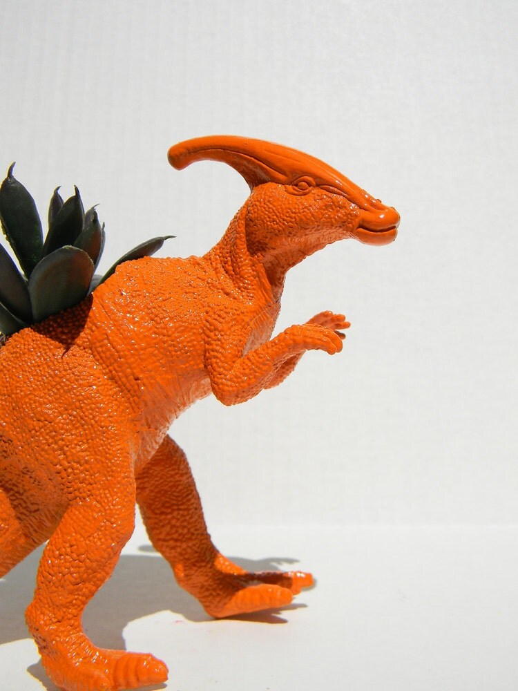 orange colour dinosaur