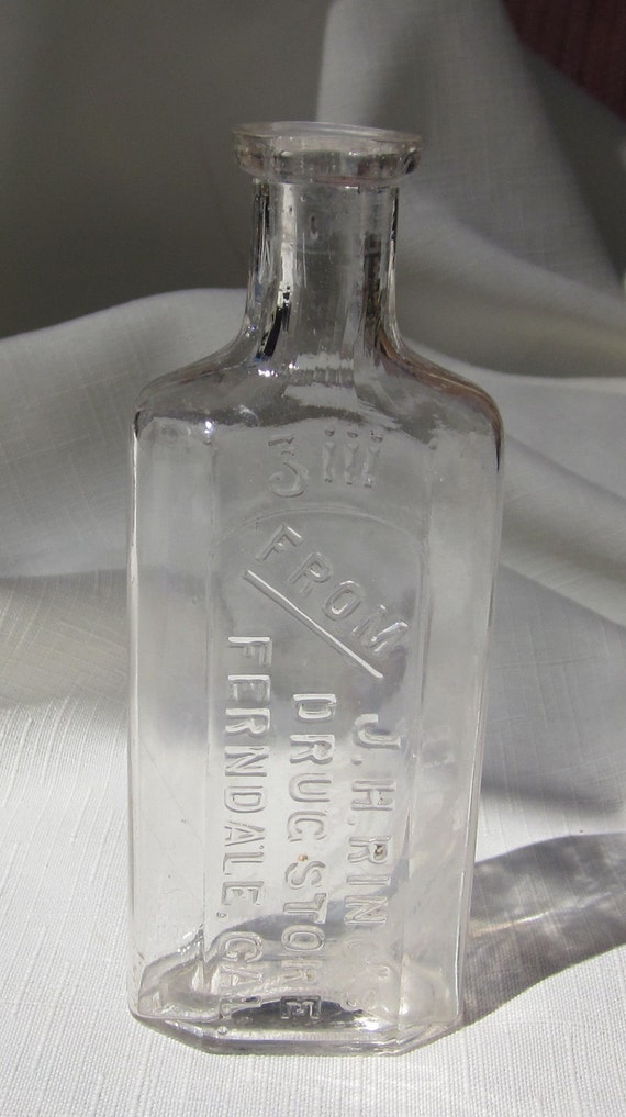 Antique Embossed Clear Colored Ferndale CA Druggist Bottle