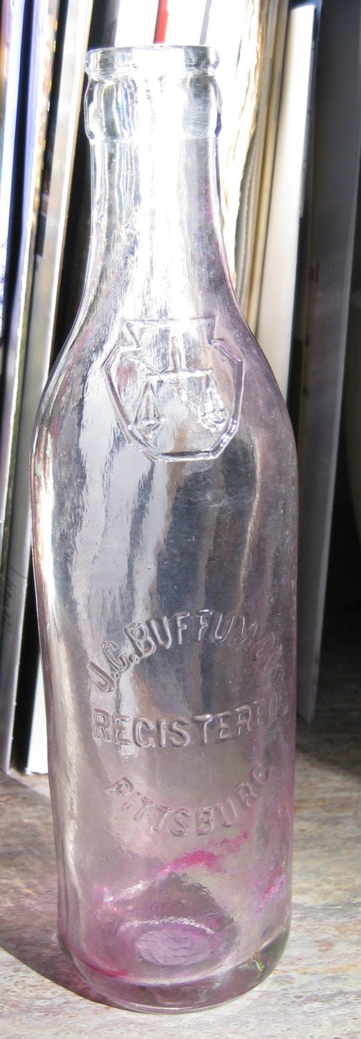 Antique Clear Colored Glass Bottle Embossed with J. C.