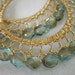 Celsian Aquamarine and Gold Wire laced Hoop Earrings