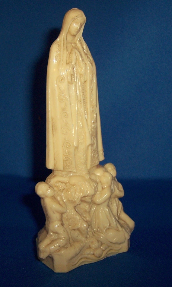 virgin mary plastic statue