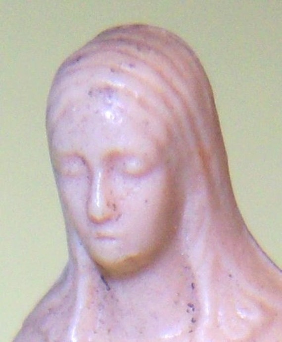 plastic virgin mary statue