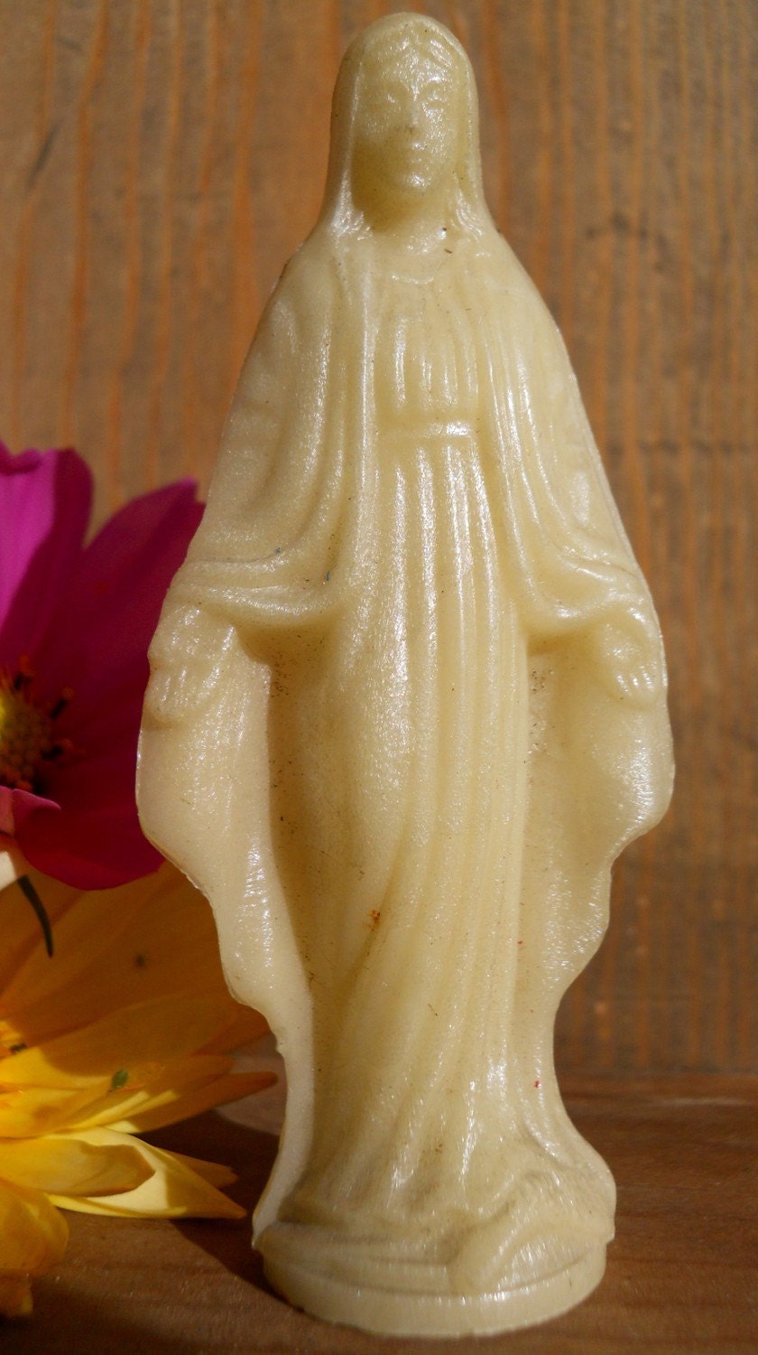 vintage Virgin Mary statue glows in the dark