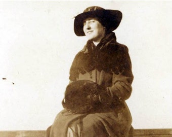 1918 Women Fur COat and Muff on Fence Sepia Original vintage photo