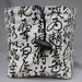 large kanji on cream and metallic gold swirls on blue square bottom dice bag