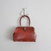1960s vintage large redwood cordovan leather handbag