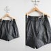 1980s vintage black leather shorts